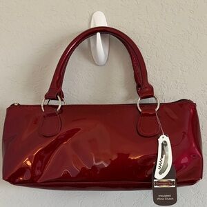 NWT PRIMEWARE INC. Insulated wine clutch.
Thermal lined wine bag.
